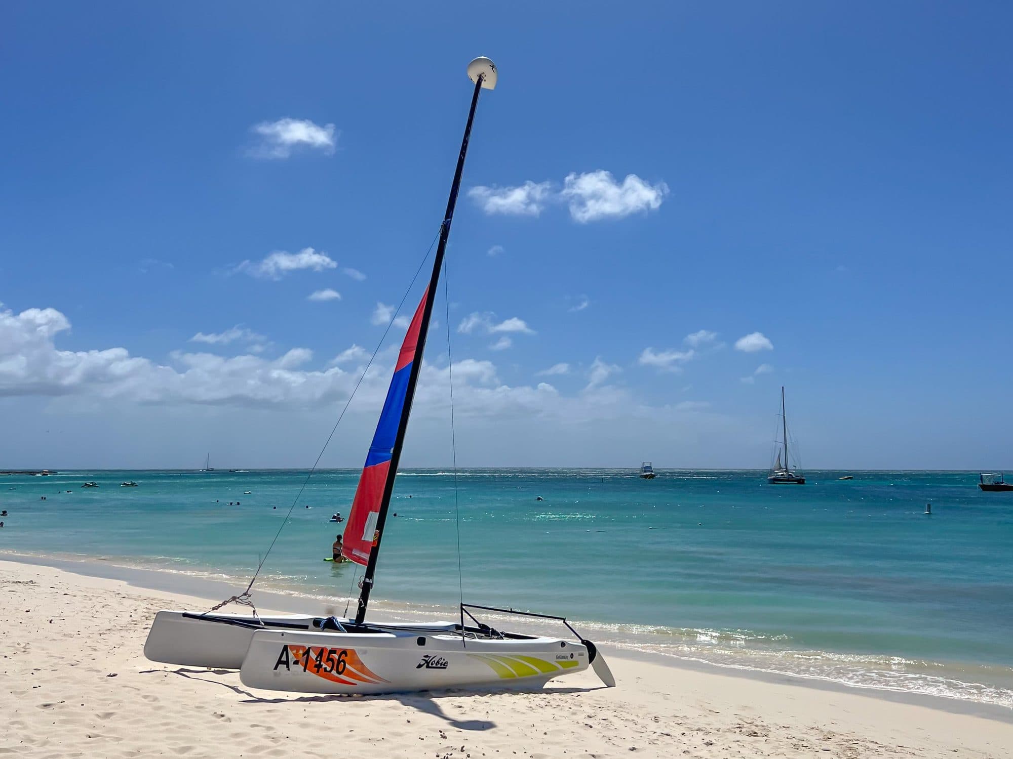 A sailboat resting on the beach in Aruba