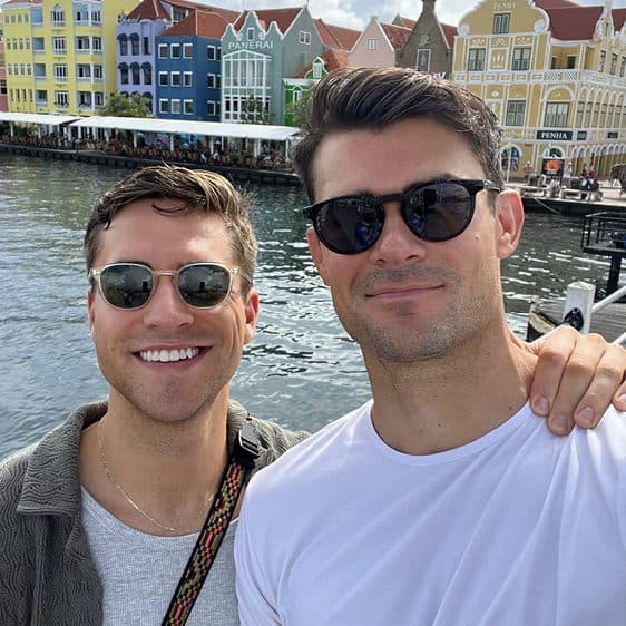 Billy and a friend in front of Willemstad's colorful waterfront