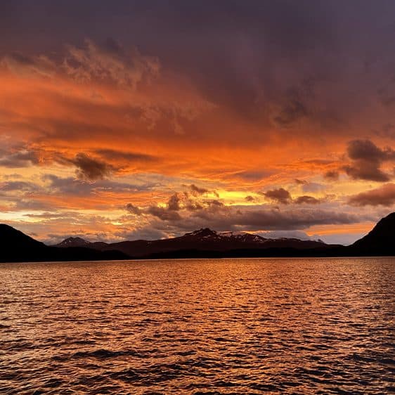 Orange clouds reflected in the water