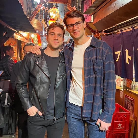 Billy and a friend inside a cozy izakaya